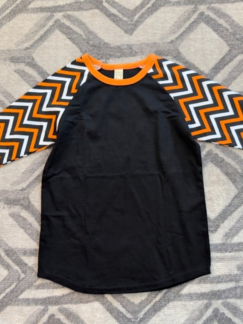 Kids Black Raglan Long Sleeve Tee with Orange Chevron Sleeves